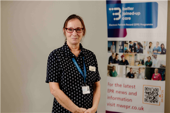 Elizabeth Reynolds in her ward clerk uniform